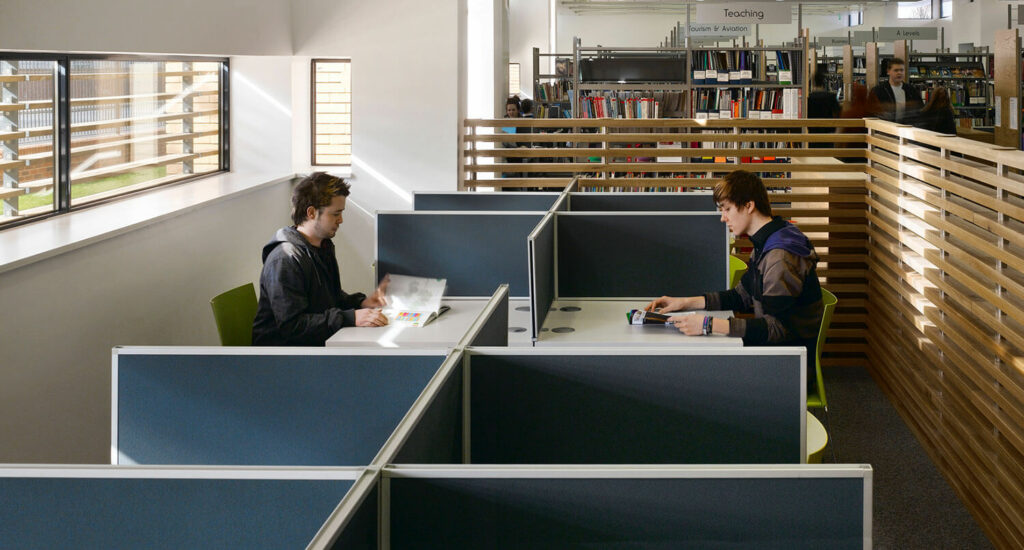 students working in pods in the library