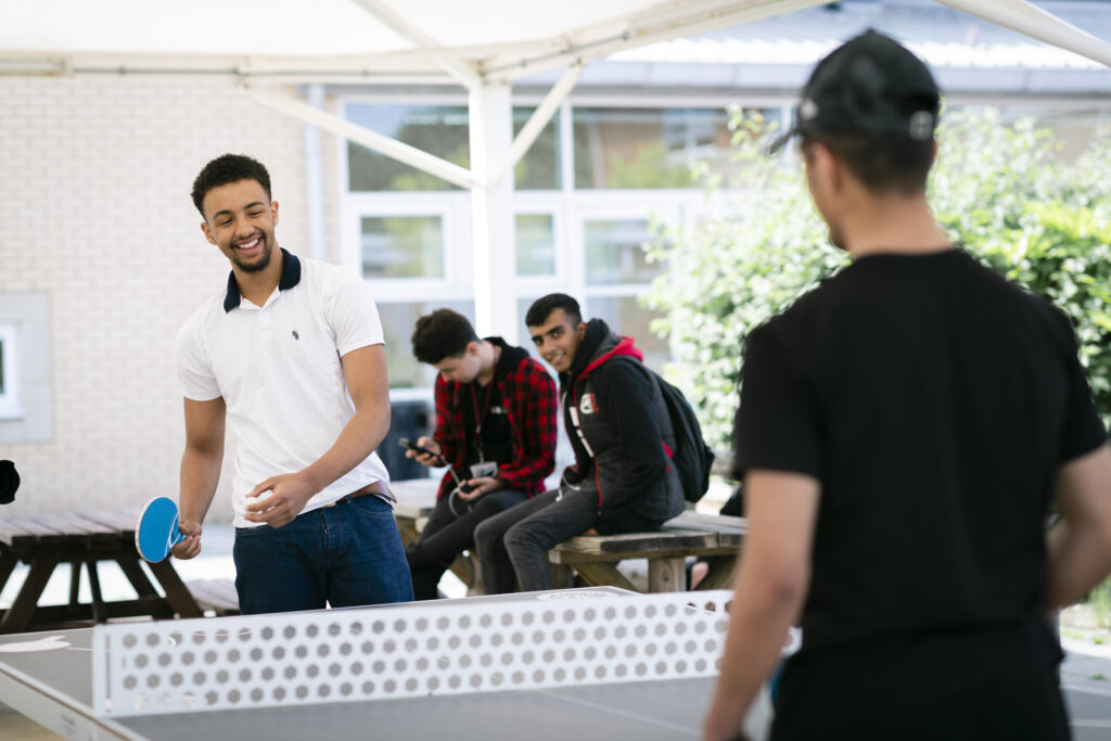 students playing table tennis